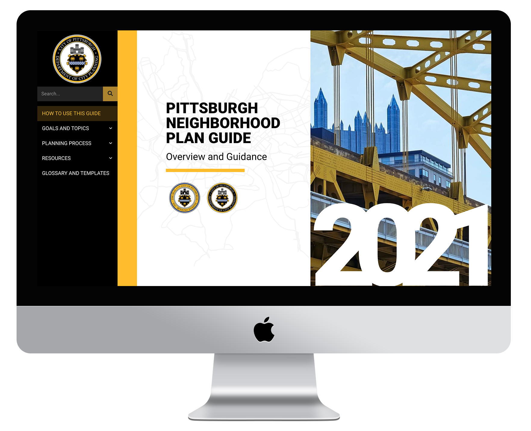 An iMac showing the homepage of a web design project. Featuring a lefthand navigation, and a bold hero image that shows a covered bridge.